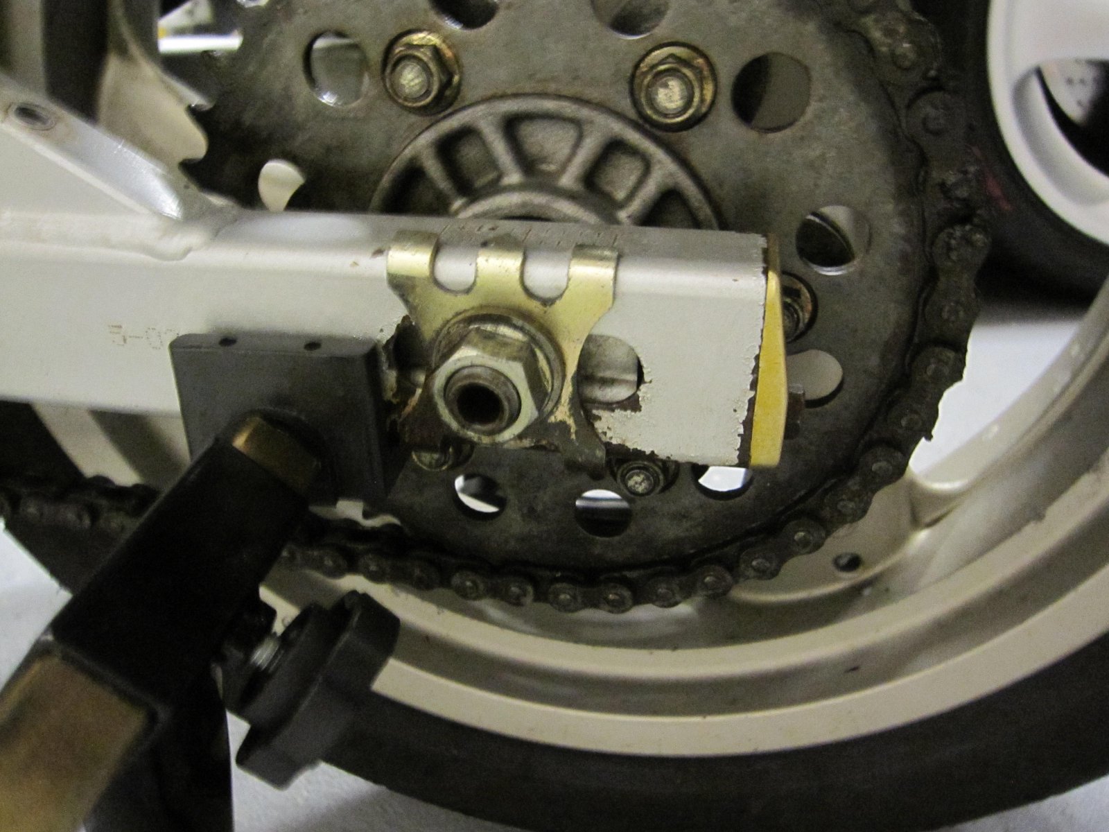 600SS rear chain adjuster.JPG