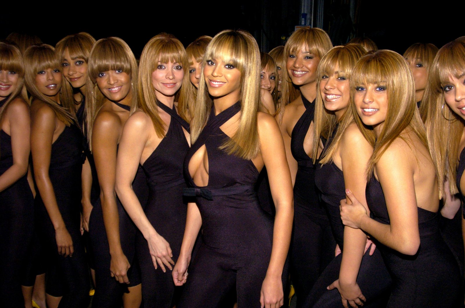 Beyoncé-surrounded-look-alikes-December-2003-Billboard.jpg
