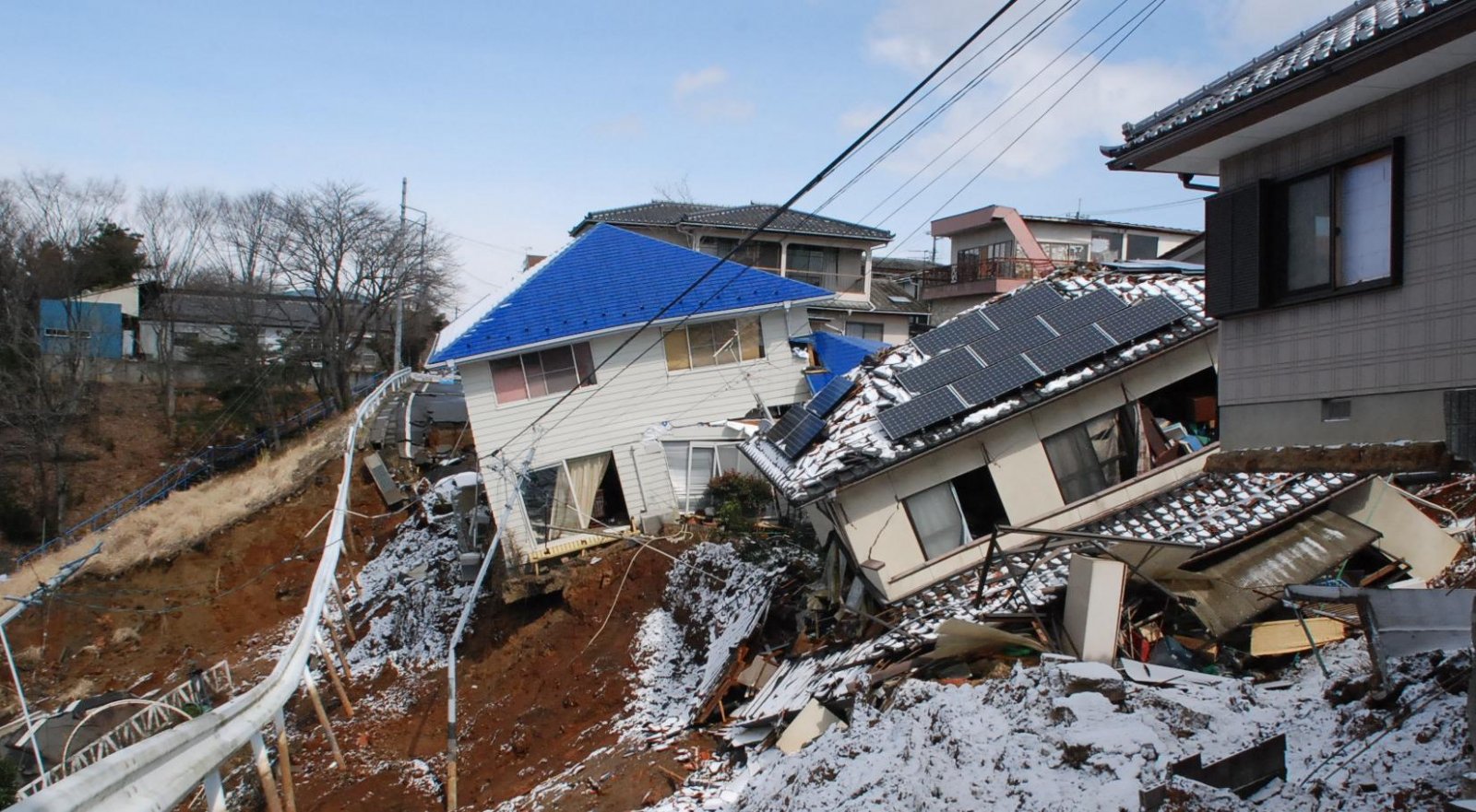 collapsed-house-in-great-east-japanearthquake-2349758005.jpg