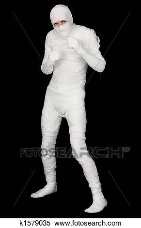 egyptian-mummy-on-a-black-background-stock-photography__k1579035.jpg