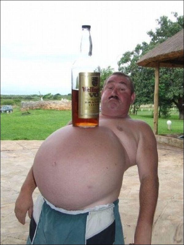 Funny-Fat-Man-With-Bottle-Of-Wine-On-Belly-6.jpg