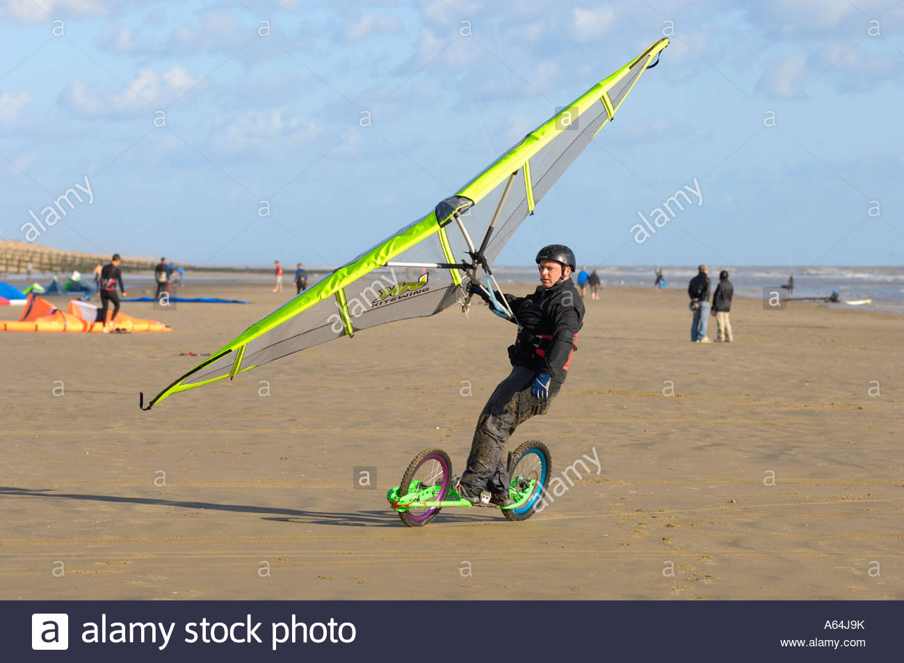 land-board-surfer-on-the-beach-at-camber-sands-rye-east-sussex-england-A64J9K.jpg