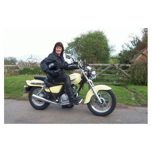 liz-lynne-on-her-motorbike.png