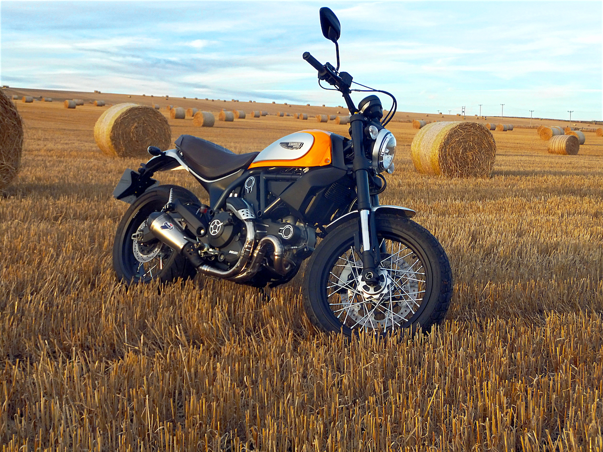 Scrambler in field of bales copy.jpg