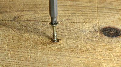 stock-footage-electric-screwdriver-unscrewing-screw-in-wood.jpg