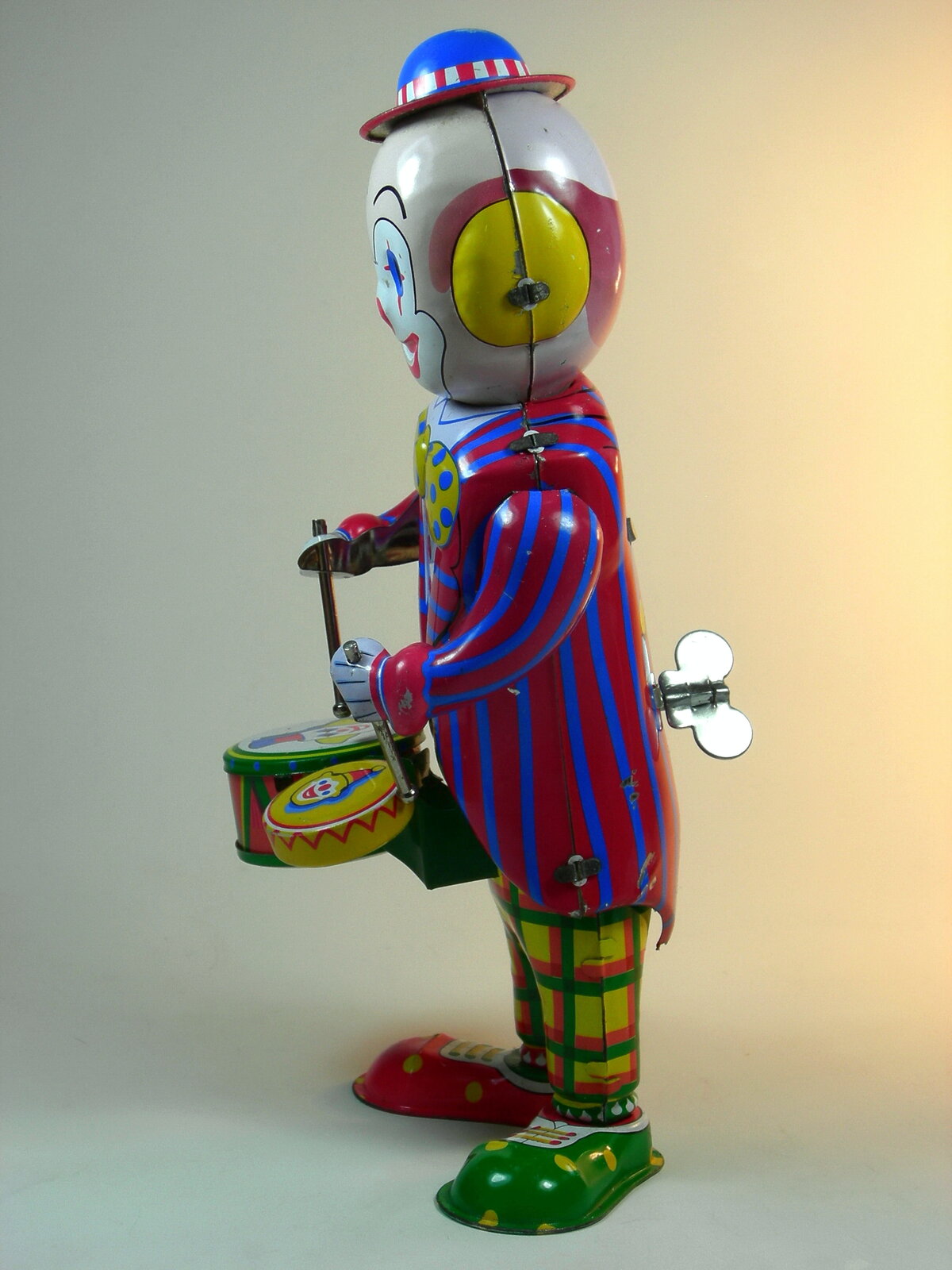 Unknown_Chinese_Maker_Tin_Wind_Up_Clown_Drummer_Side.jpg