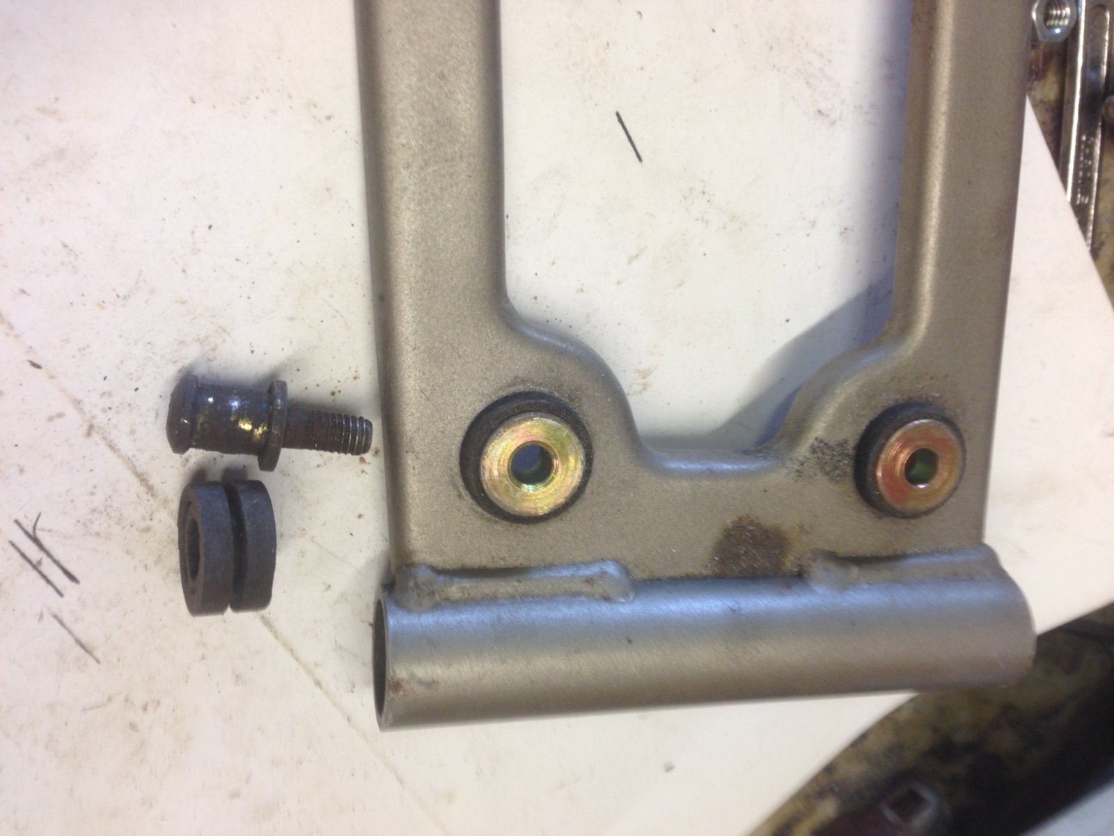 Vacuum fuel pump bolt and top hat washer.JPG