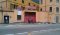 MotoGuzzi factory gate Mandello June 2012.jpg