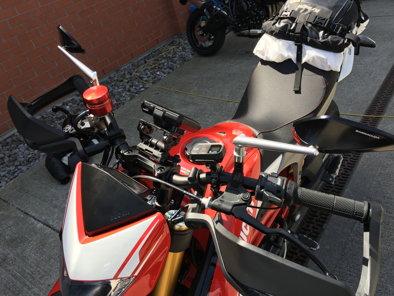 The mirrors will go, I don't like them as much. Heated grips, brake fluid and gps mount.