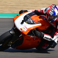 Learning how to get the power on early in the corners.