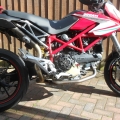 Changed the rear ride height adjuster for a 916 adjustable rod, now sits at 890mm seat height!! even the evo sp is only 875mm, i think it looks awesome, love the bike.